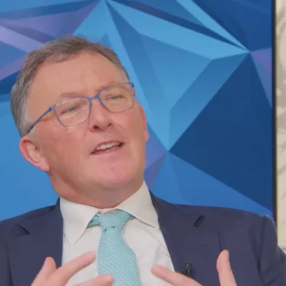 Tom Carroll talking in television studio